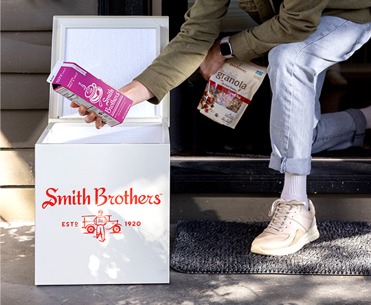 Porchbox with groceries placed at the door